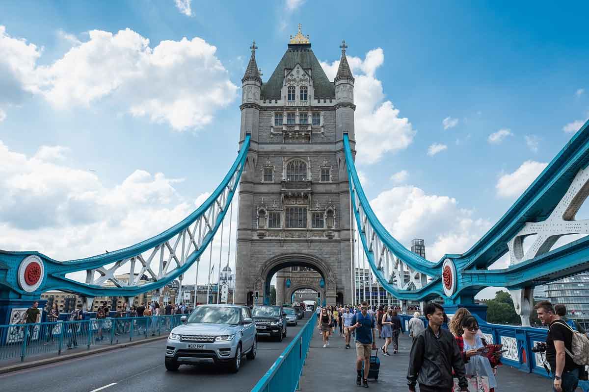 Tower Bridge London with traffic and pedestrians