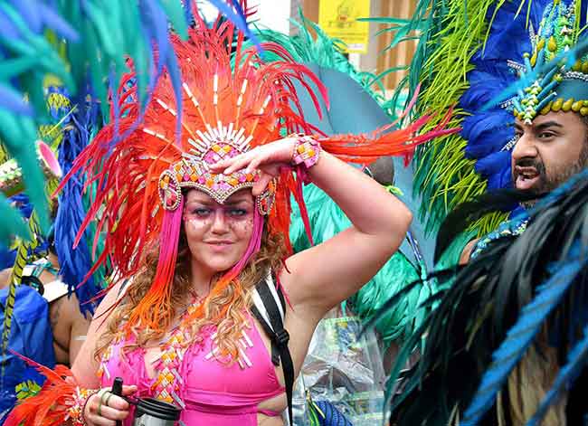 Notting Hill Carnival in London. Colourful dresses.