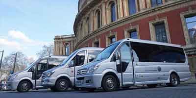 Mini vans used for shared transfers between airports and Central London hotels