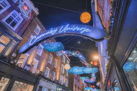 Carnaby Street London decorated with Christmas decorations, lights