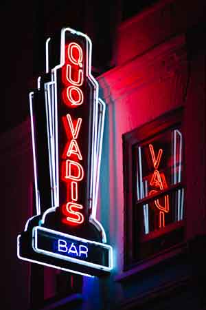 Quo Vadis bar in Soho London, neon sign, nightlife